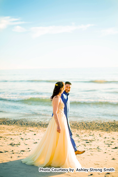 Indian wedding couple possing for outdoor photoshoot