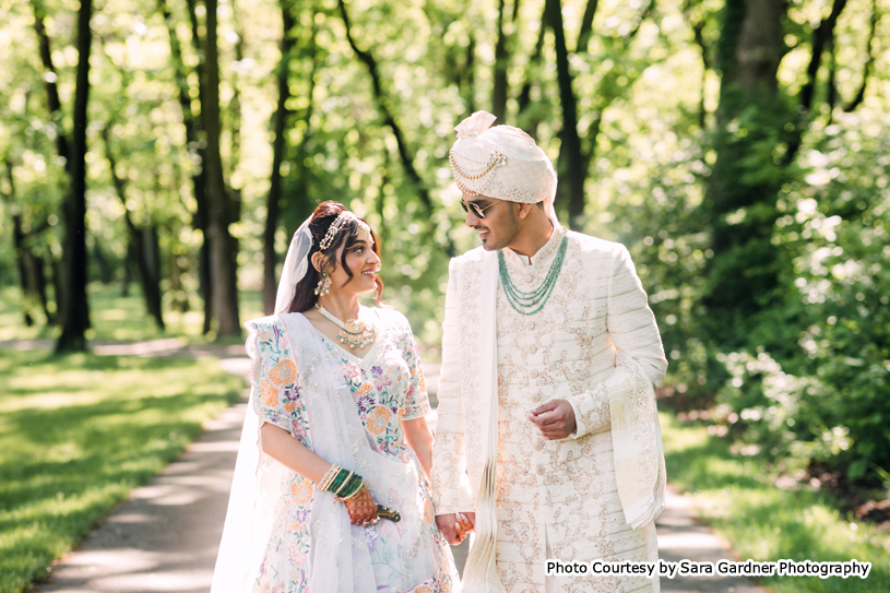 Indian wedding couple possing for outdoor photoshoot