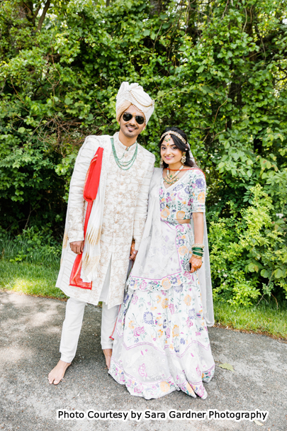 Indian wedding couple possing for outdoor photoshoot