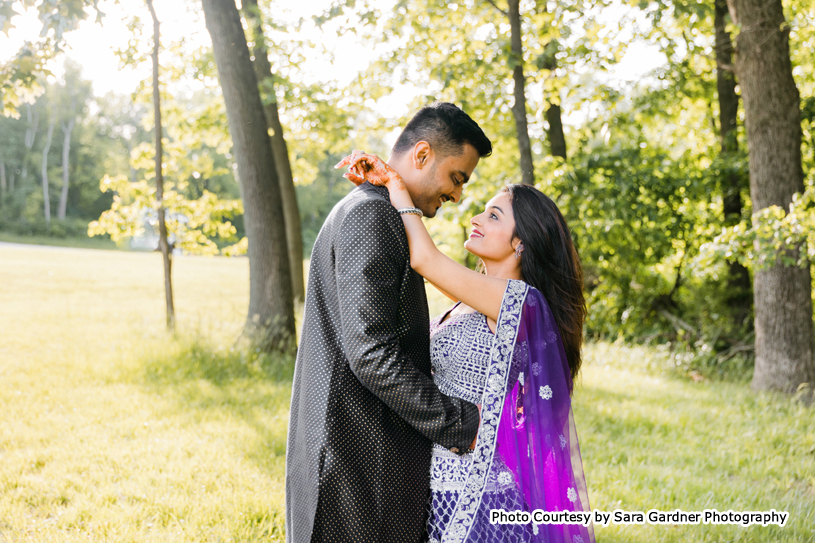 Indian wedding couple possing for outdoor photoshoot