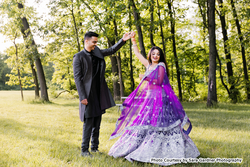 Indian wedding couples Khushboo and Dhrudeep possing for outdoor photoshoot