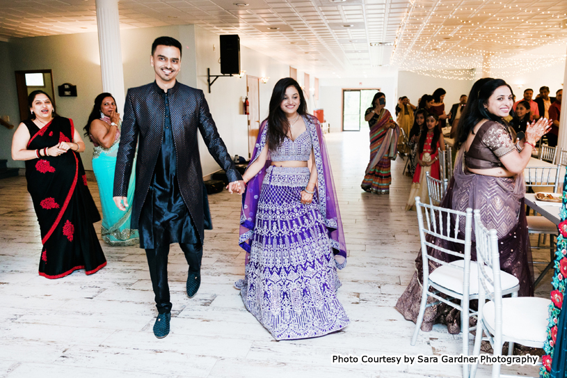 Grand entry of indian wedding couple