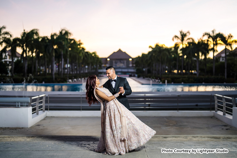 Indian wedding couple possing for outdoor photoshoot