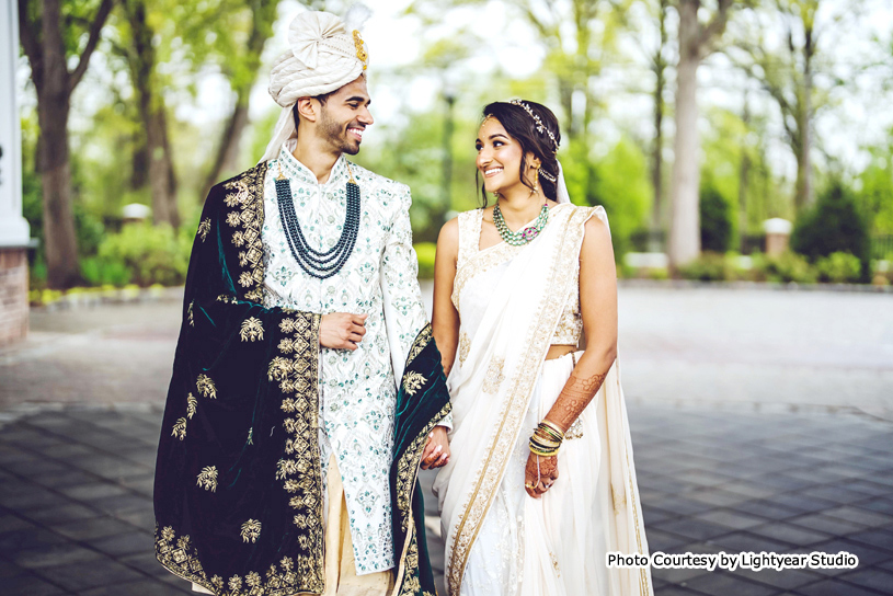 Indian wedding couple possing for outdoor photoshoot