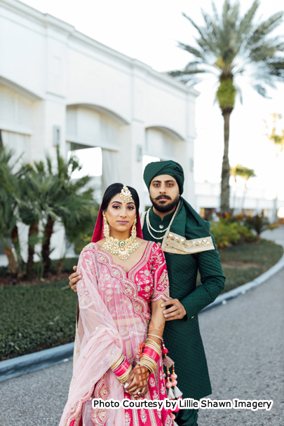 Indian Wedding Couple Manisha and Akaash posing for outdoor photoshoot