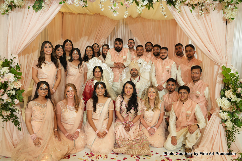 Indian wedding couple with their friends