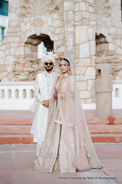Indian wedding couple possing for photoshoot