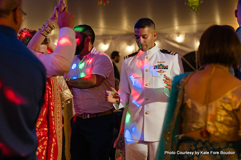 Happiest groom with friends and relatives