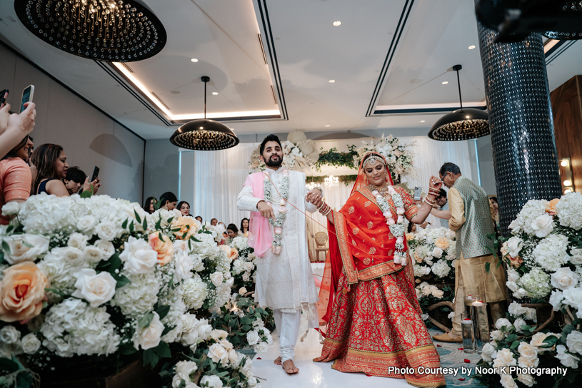 Grand entry of indian wedding couple