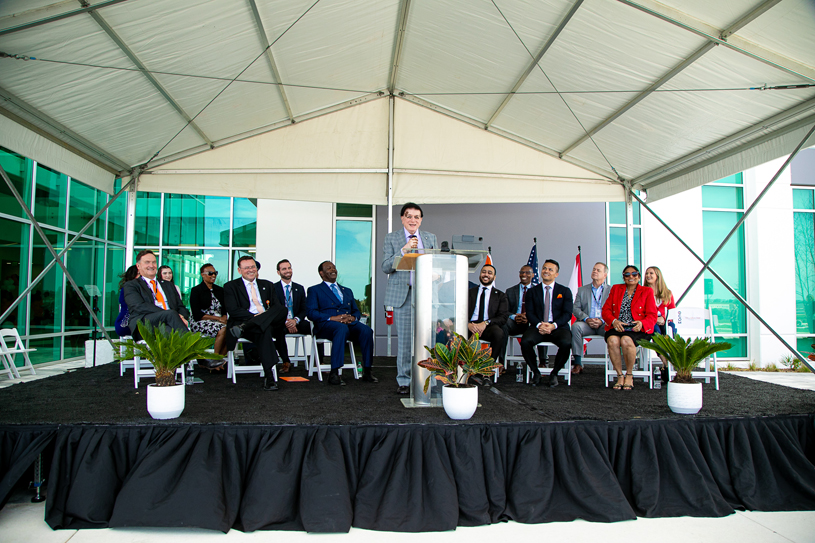 Dr. Kiran Patel speaking at the opening of Orlando College of Osteopathic Medicine