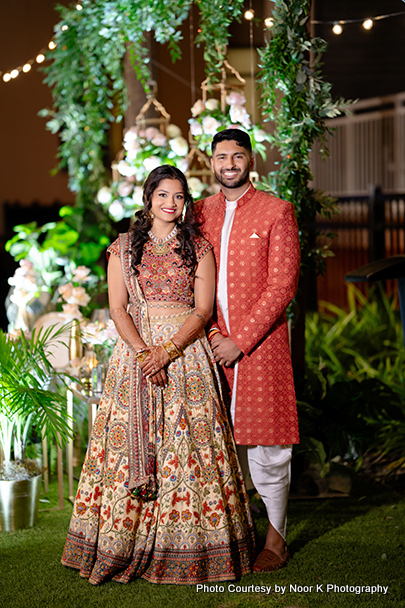 Indian bride and groom posing for photoshoot