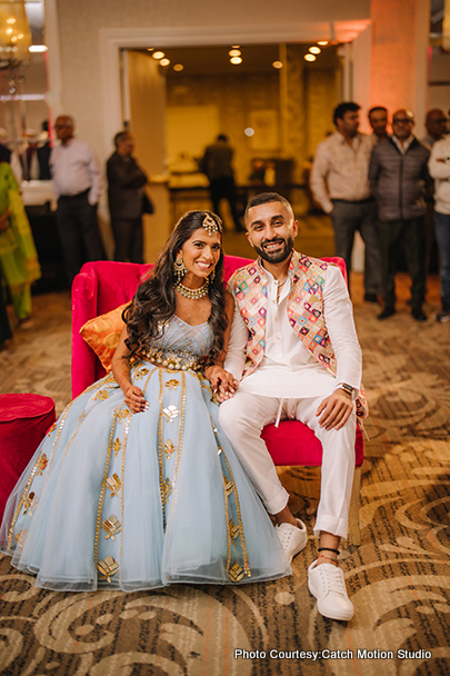 Indian love birds posing for the photoshoot