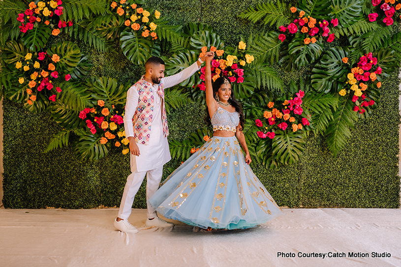 Indian bride and groom posing for the photoshoot