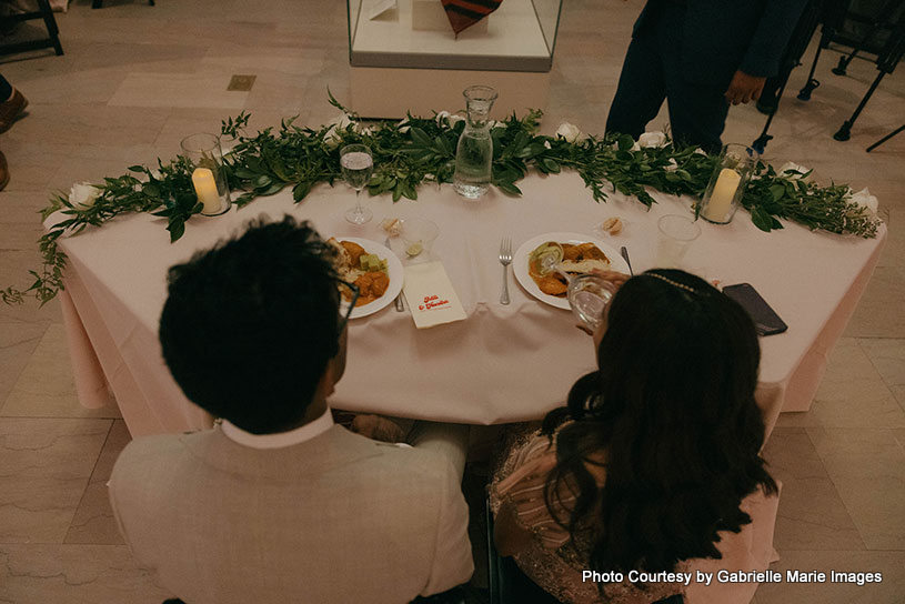 Indian wedding couple having their dinner