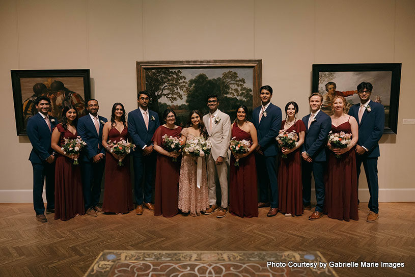 Glamorous Indian bride and groom with bridesmaids and groomsmen 