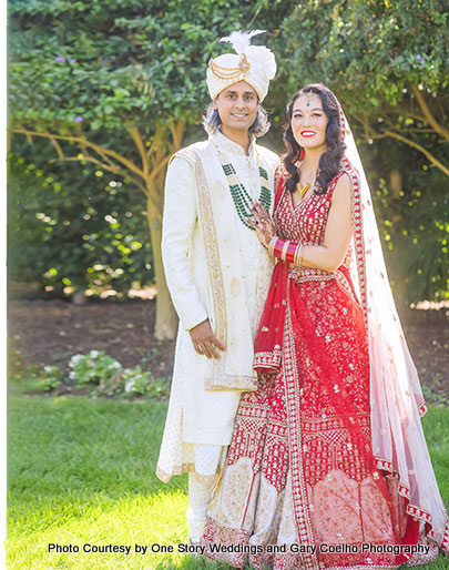 Indian groom wearing turban on his head give maharaja look