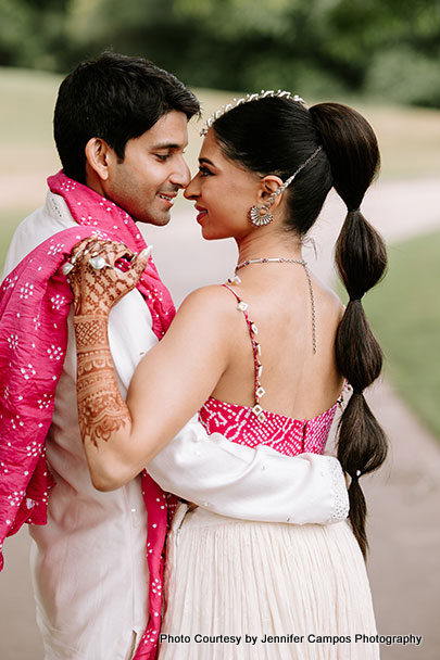 Indian bride and groom possing for photoshoot