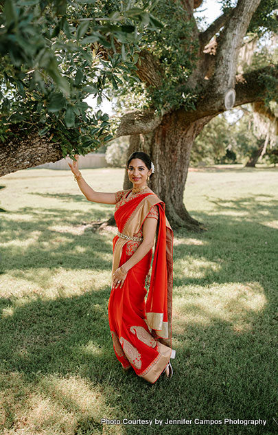 Red and golden best combination for wedding attire