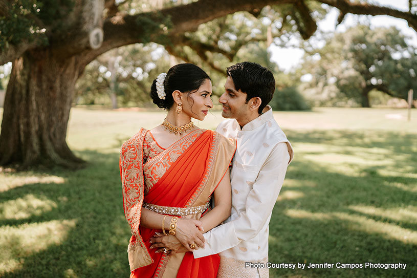 Indian couple looking each other with love
