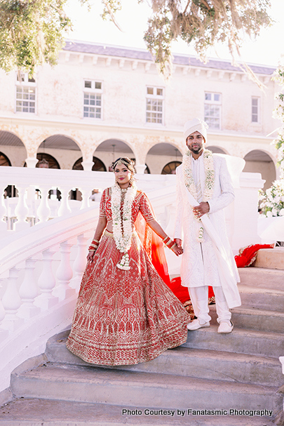 Bride Kashmira and groom Paul smiling during a close-up wedding portrait