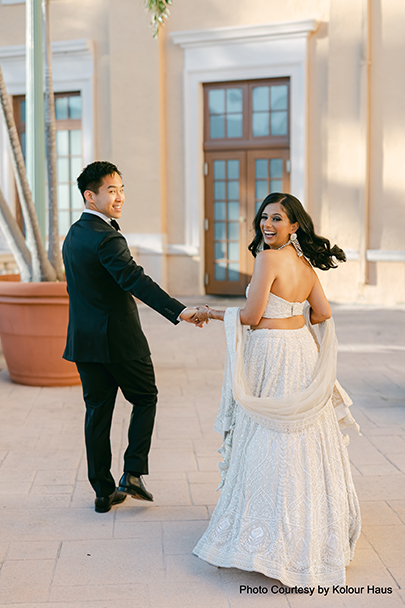 Navya and Eddy walking hand-in-hand