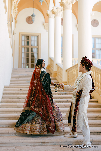 Indian wedding couple holds each other