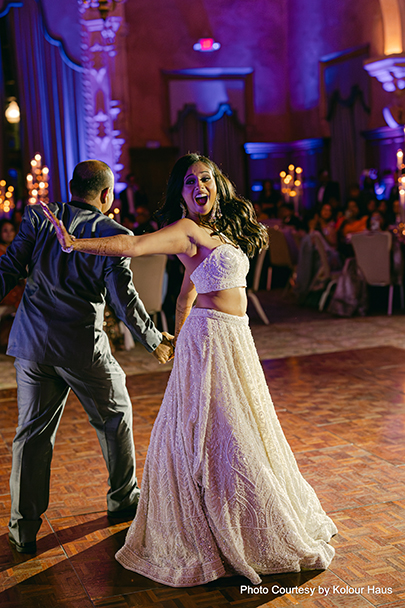 Navya and Eddy's first dance transitioning from Ed Sheeran's 'Perfect' to a lively Bhangra performance