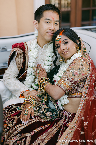 Indian wedding couple posing for photoshoot