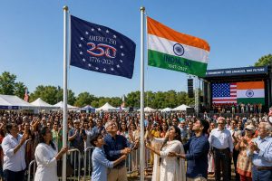 A simultaneous flag-raising during a community dual-anniversary celebration in the summer of 2026.