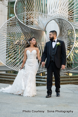 Indian weding couple posing in outdoor location