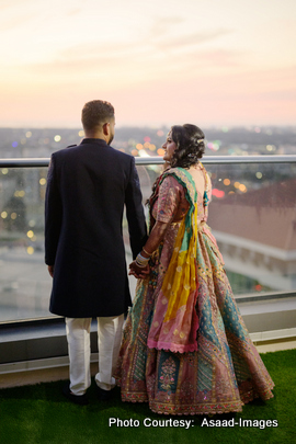 Tithi and Bhaumik holds hands during sunset pre-wedding photoshoot in Tampa