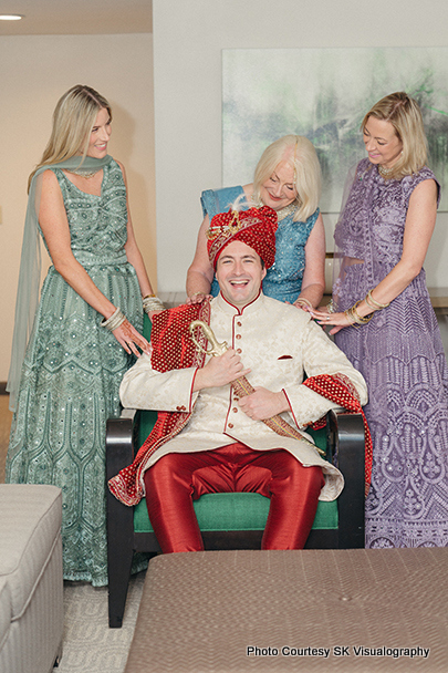 Wedding guests and family members sharing a joyful moment at Sujata and Mark wedding celebration