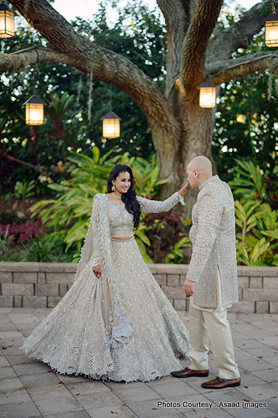 Indian bride and groom feel enjoying their love moment