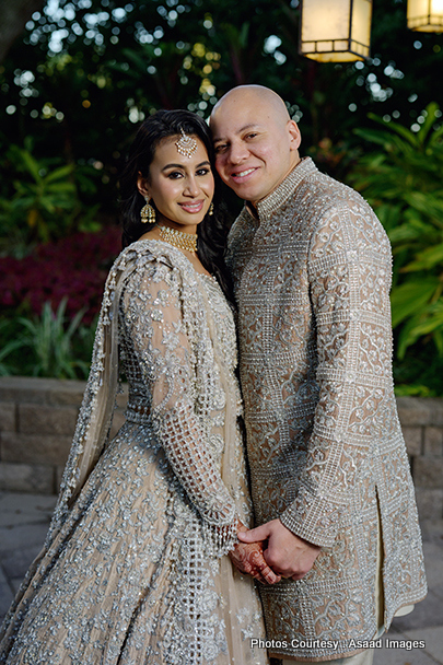 Indian bride and groom look outstanding in wedding attire