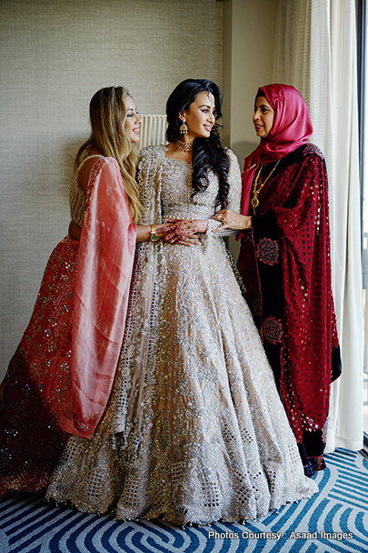 Indian bride with bridesmaid capture